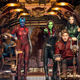 Yondu, Rocket, Nebula, Gamora, Star-Lord, Mantis, Drax, and Baby Groot stare out their spaceship's cockpit window.